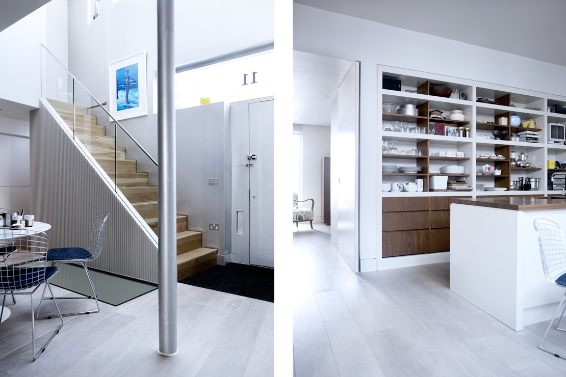 A staircase passes up through the double height space at the front of the house flooding the kitchen/dining space with natural daylight.