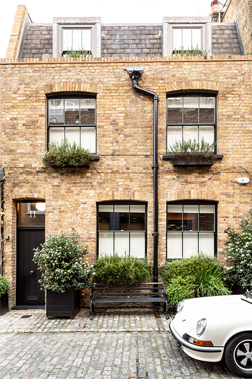 The mews house was entirely refurbished and a roof extension added.