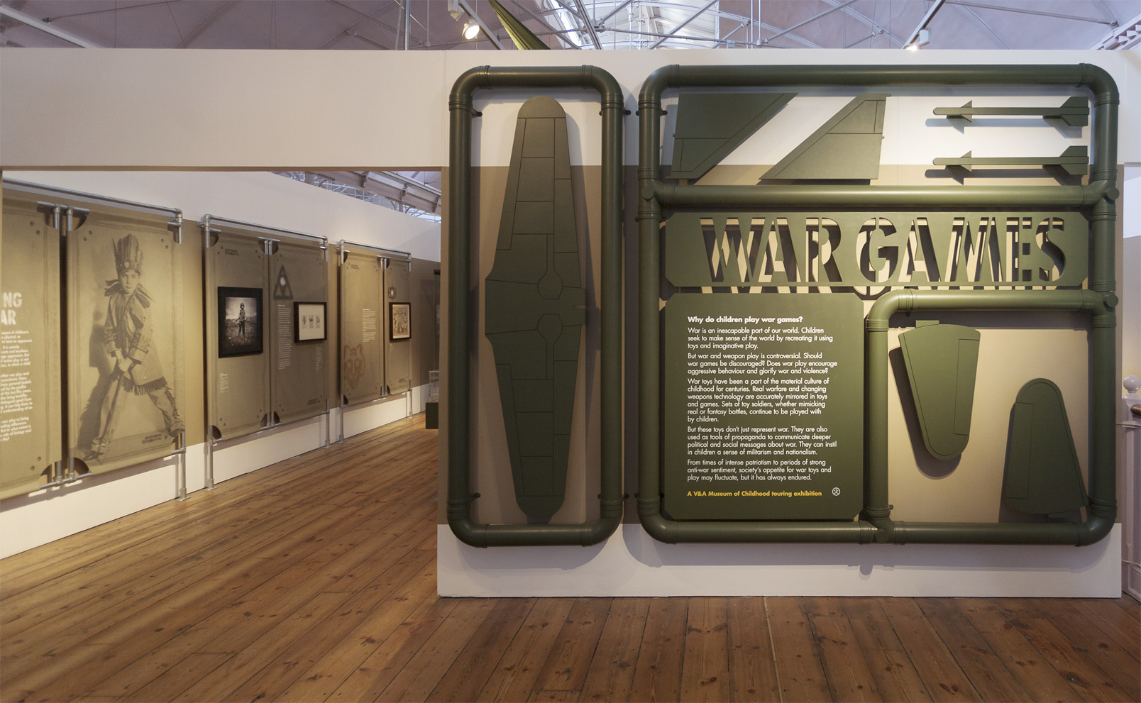 Like an oversized Airfix model kit, objects are mounted to their plastic sprues and flank the entrance marking the beginning of the exhibition.