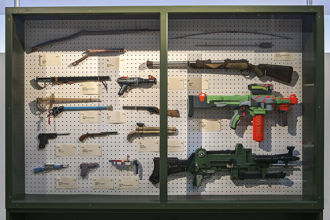 Toy gun cabinet.