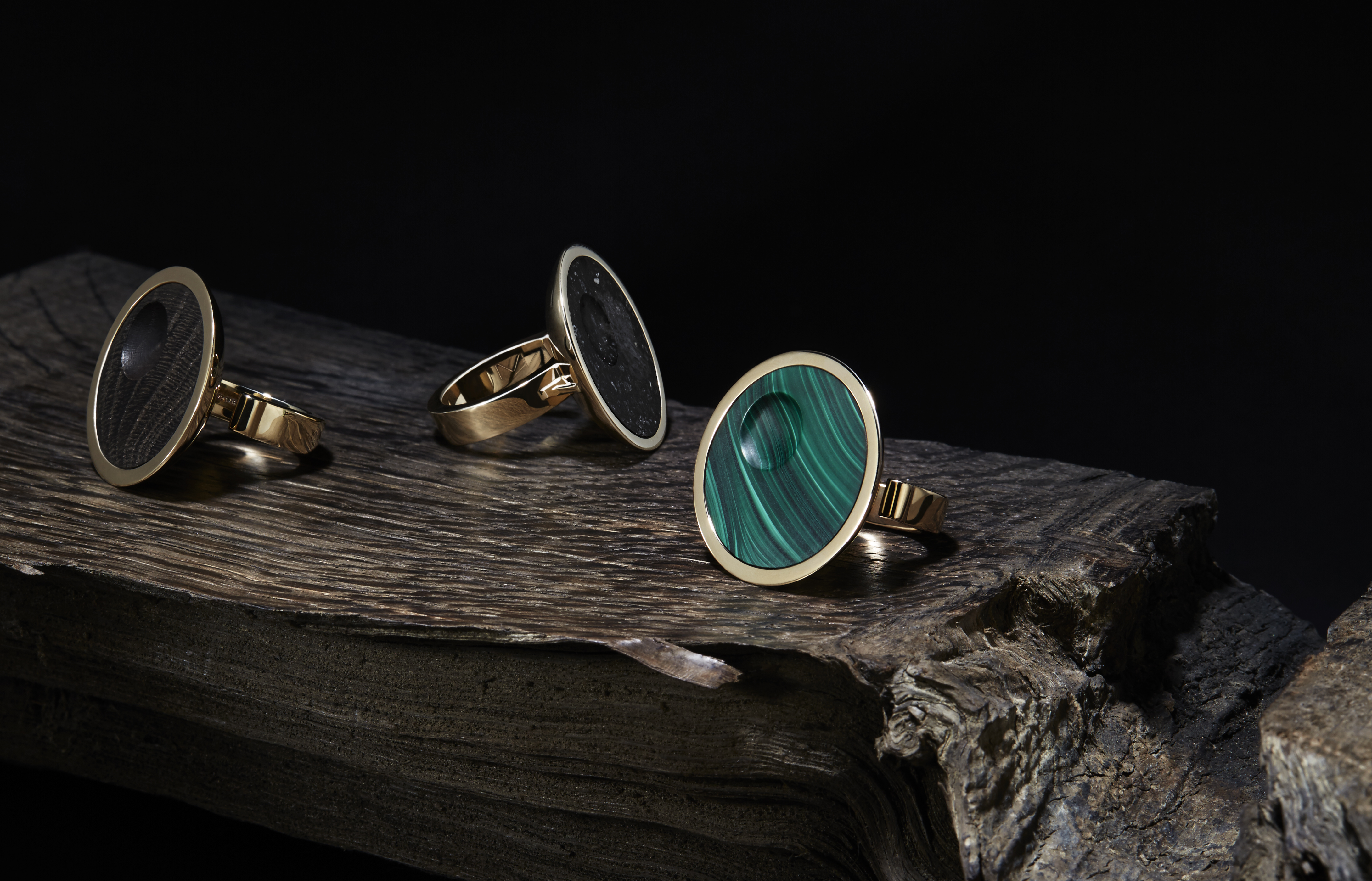 Collection of Oscar rings in solid gold, inset with malachite, eight thousand year old oak or meteorite.