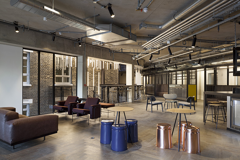 Club rooms and co-working space overlooking the atrium.